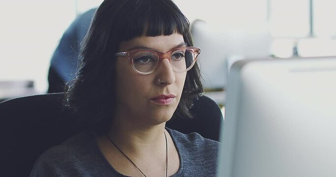 Face, research or programmer woman on computer for cybersecurity, coding or data analysis in office. Hacker, developer or employee on tech for software code, programming or startup analytics review.