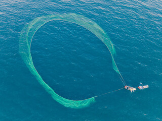 Fishing trawlers are fishing in the sea by huge net in Phu Yen, Vietnam