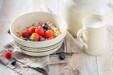 Tasty and healthy oats with and yoghurt and berries.