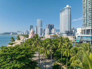 Nha Trang landscape with beach and high-rise buildings, famous vacation destination in Khanh Hoa, Vietnam