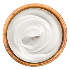 sour cream in wooden bowl, mayonnaise, yogurt, isolated on white background, full depth of field