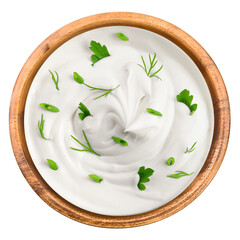 sour cream with onion, parsley, dill, herbs in wooden bowl, mayonnaise, yogurt, isolated on white background, full depth of field