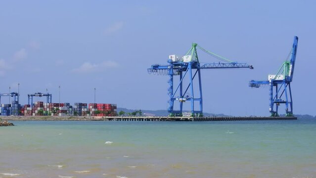 Container port with Nambo beach in the foreground, Southeast Sulawesi