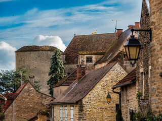 Fototapeta na wymiar Medieval city of Chateauneuf in Burgundy. A cozy, cute town that grew up around a huge old castle.