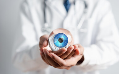 Digital vision eye care concept. Doctor using technology for eye test vision, checking eyesight,...