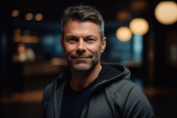 Obraz premium Portrait of a handsome middle-aged man smiling at the camera.