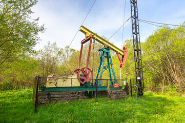 Pump jack for oil extraction in the village of Zatwarnica in the Bieszczady Mountains, Poland.