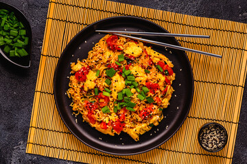 Korean style instant noodle, Shin Ramyeon with tomatoes and scrambled eggs.