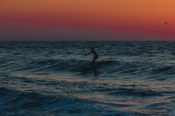 silhouette of a surfer. The photo was taken in La Union Philippines.