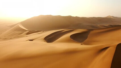Drone or sand landscape in Namibia desert for sunset, nature beauty on dry land, horizon or Africa drought. Hill, earth or freedom adventure on an open or hot terrain in morning sunrise on summer day - Powered by Adobe