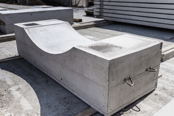 Concrete block with embedded parts for the construction of engineering structures.