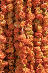 sun dried bell peppers. It is sold in the market as strung on a rope.