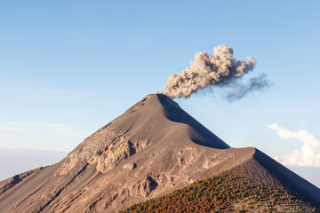 Erupting Volcan Fuego on a bright, clear day near Antigua, Guatemala, Central America