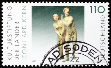 Postage stamp Germany 2000 the Expulsion from Paradise, Sculpture by Leonhard Kern, was a German sculptor