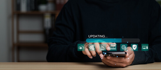 Man installing update process. Software updates or operating system upgrades to keep your device up to date with enhanced functionality in new versions and improved security. - obrazy, fototapety, plakaty