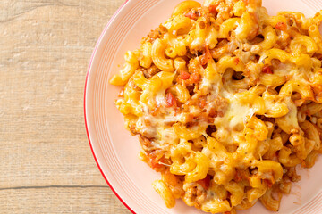 homemade macaroni bolognese with cheese