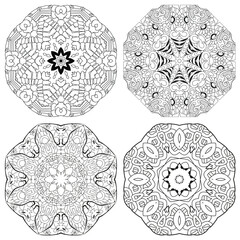 Hand drawn zentangle set of 4 mandalas for coloring page.