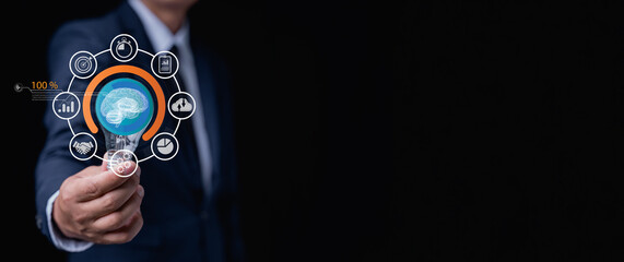 Businessman hand holding light bulb and smart brain inside and innovation icon network connection, innovative technology in science and artificial intelligence technology. Creative, new ideas