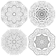 Hand drawn zentangle set of 4 mandalas for coloring page.