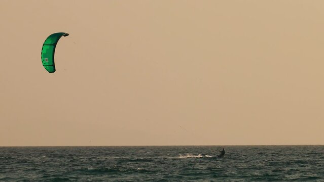 Windsurfer On Water Against Background Of Sea.