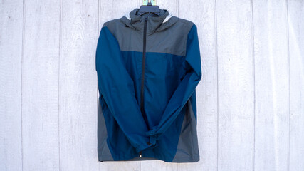 A Blue and Gray Rain Coat
