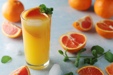 Red oranges juice with mint and ice	