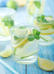 Glasses with lemon and lime lemonade