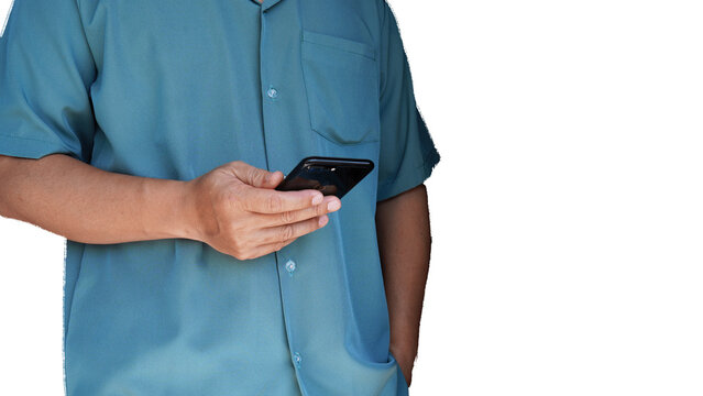 man wearing green collared shirt stand using smartphone transparent white backdrop
