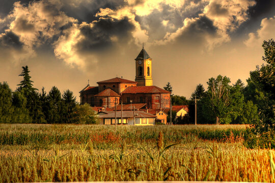 View across fields of local village church, Lobbi, Alessandria, Piedmont, Italy