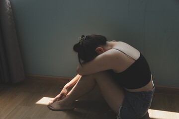 Fototapeta premium panic attacks alone young girl sad fear stressful depressed emotional.crying use hand cover face begging help.stop abusing domestic violence in women,person with health anxiety,people bad feeling down