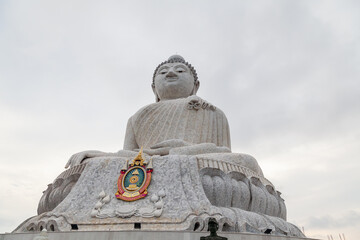 The largest white marble statue of the big buddha in the world on the island of phuket in thailand. Popular place among tourists.