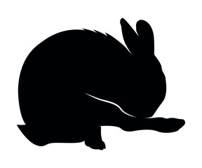 Rabbit silhouette in vector. Easter bunny. Can be used as a stencil or template for festive decorations, postcards, shop windows, logos