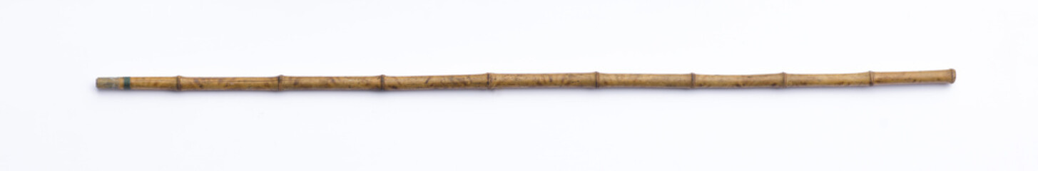 long bamboo stick isolated on white background
