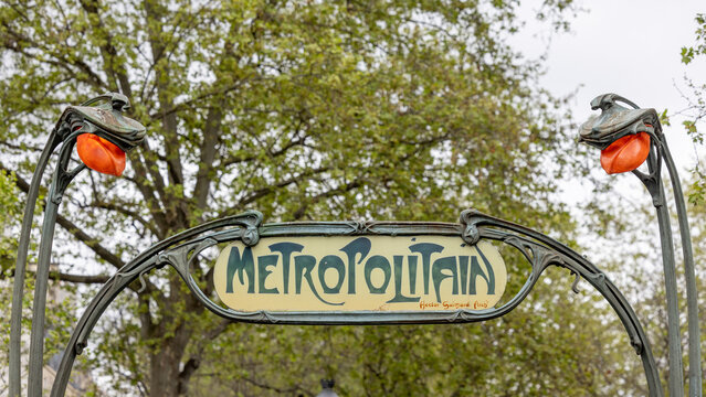 Paris, France April 29th 2023 Metro station entrance at Abbesses station near Montmartre. Vintage subway entrance designed by Hector Guimard