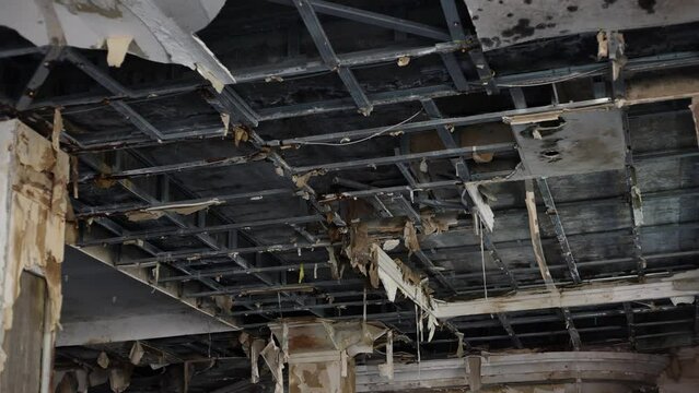 Burnt building from shelling during the war. Premises after hostilities.