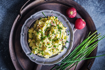 Rustic mashed potato with scallions above
