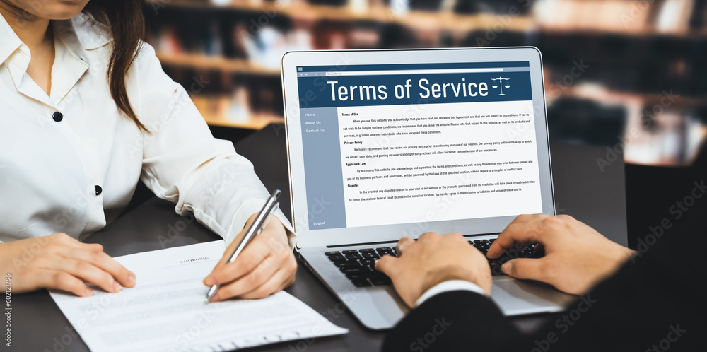 Poster online term of service conditions showing astute rules and regulations in using the website on a lap
