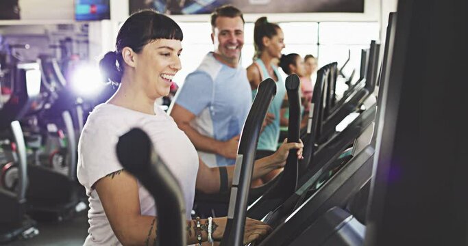 Fitness, running and treadmill with woman at gym for weight loss, workout and endurance goal. Cardio, stamina and health with people training in sports center for challenge, energy and performance