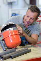 a worker with an instrument