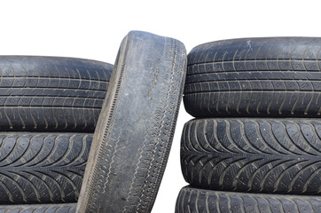 old worn out tire next to another old tire isolated on white background © yarbeer
