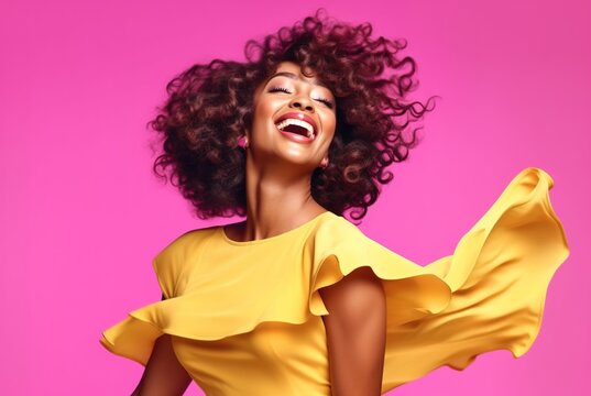 Young african american woman laughing in the studio in a yellow dress on a pink background. Generative AI