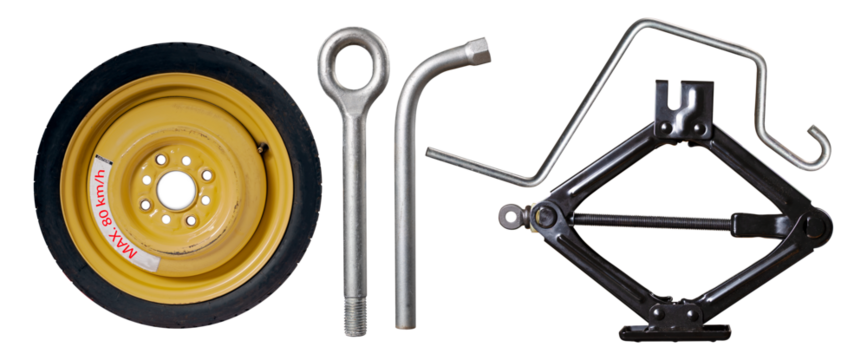 Set for changing a spare wheel in a passenger car. Isolated background.