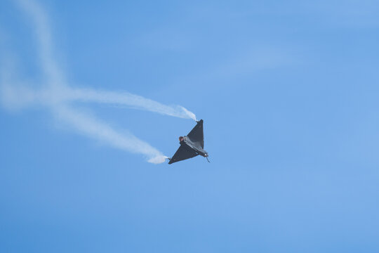 FIghter jet in sky maneuver and takeoff.