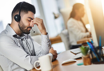Headache, tired or man in call center with burnout, head pain or overworked in crm communication....