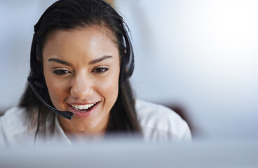 Talking, face or happy woman in call center consulting or speaking at customer services help desk. Virtual assistant, friendly girl or sales consultant in telemarketing or telecom company office