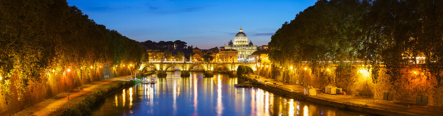 Fototapeta na wymiar Evening panorama view of Saint Peters basilica at sunset in Vatican. Italy 