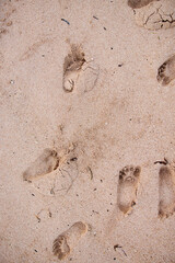 Footprints on the sand of the ocean, texture for a layout