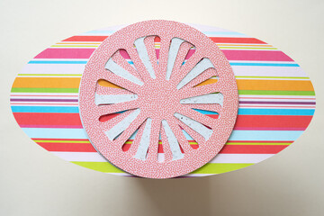 cartwheel on paper oval with stripes