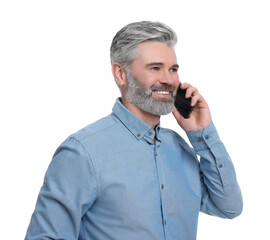 Mature businessman in stylish clothes talking on smartphone against white background