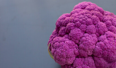 Purple cauliflower on dark background.
